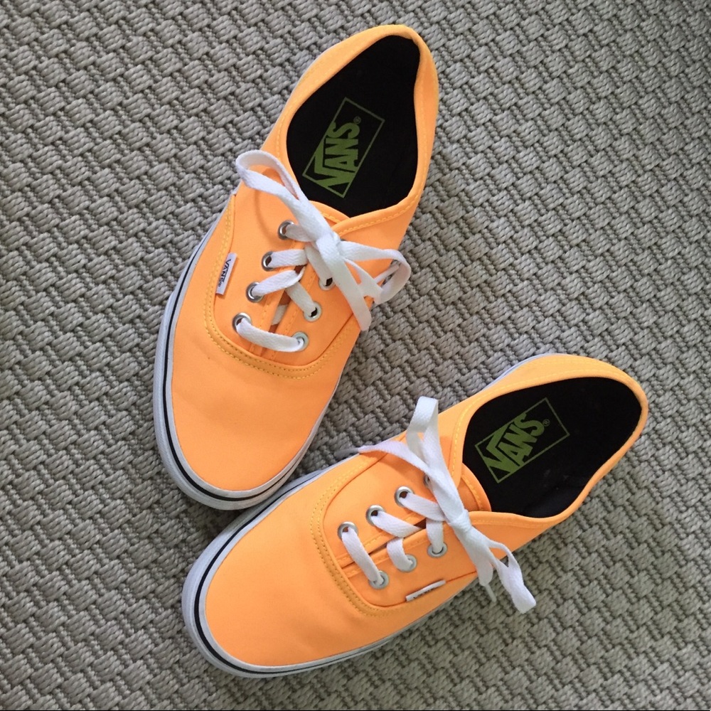 Bright orange classic vans with neon yellow sole